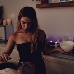 Ace Aesthetics - Lex working her magic on a dermaplaning facial client.