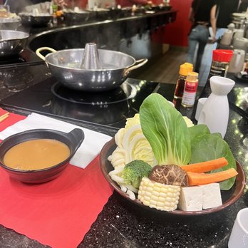 Shabu Shabu Bar - Veggies, black sesame sauce, SSB original soup base with 2x drops of spicy (not hot, perfect amount) - Japanese Near Me - Santa Ana, California