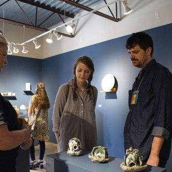 Northern Clay Center - Guests looking at pottery at an exhibition opening. - Art Galleries Near Me - Minneapolis, Minnesota Northern Clay Center - Guests looking at pottery at an exhibition opening. - Art Galleries Near Me - Minneapolis, Minnesota