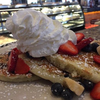 DinerLuxe - Pecan pancakes with strawberries, blueberries, bananas and whipped cream added. Delicious! - Diners Near Me - New Milford, Connecticut DinerLuxe - Pecan pancakes with strawberries, blueberries, bananas and whipped cream added. Delicious! - Diners Near Me - New Milford, Connecticut