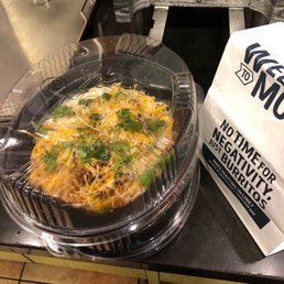 a pizza in a plastic container a pizza in a plastic container