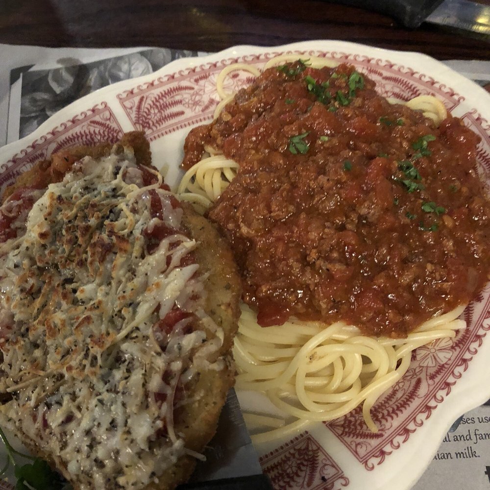 Chicken Parmigiana with pasta. Chicken Parmigiana with pasta.