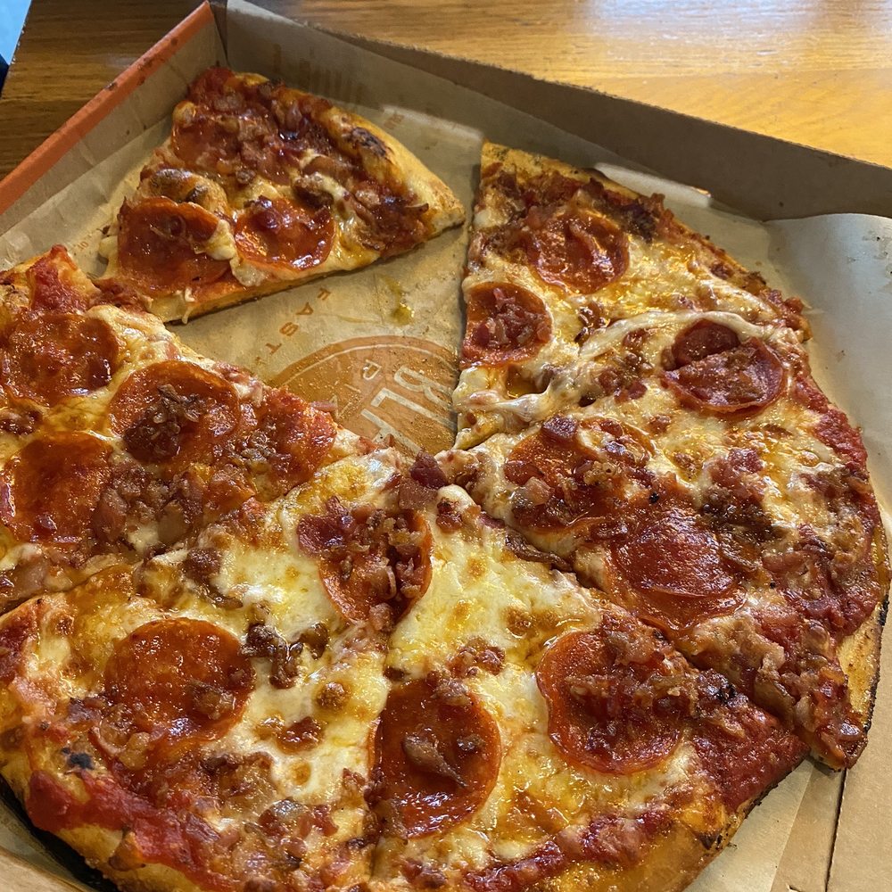 Pepperoni and bacon pizza Pepperoni and bacon pizza