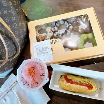 Mochido - a hot dog with ketchup and mustard - Donuts Near Me - Bakersfield, California Mochido - a hot dog with ketchup and mustard - Donuts Near Me - Bakersfield, California