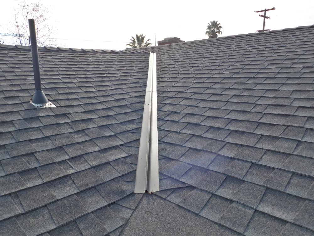 Slide of New Horizon Roofing