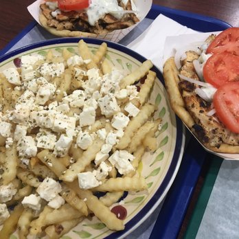 Zeus Restaurant - Some chicken pita sandwiches and a giant plate of fries with feta cheese -- yummy! - Greek Near Me - Chicago, Illinois Zeus Restaurant - Some chicken pita sandwiches and a giant plate of fries with feta cheese -- yummy! - Greek Near Me - Chicago, Illinois