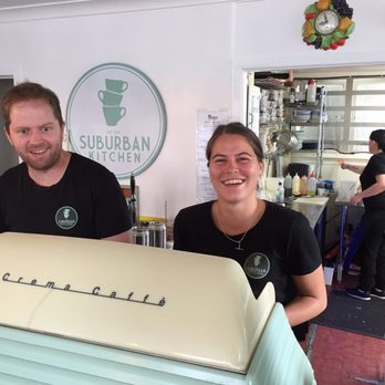 Suburban Kitchen - Zoe the owners daughter behind a cool retro coffee machine. - Cafes Near Me - Cambridge, WKO