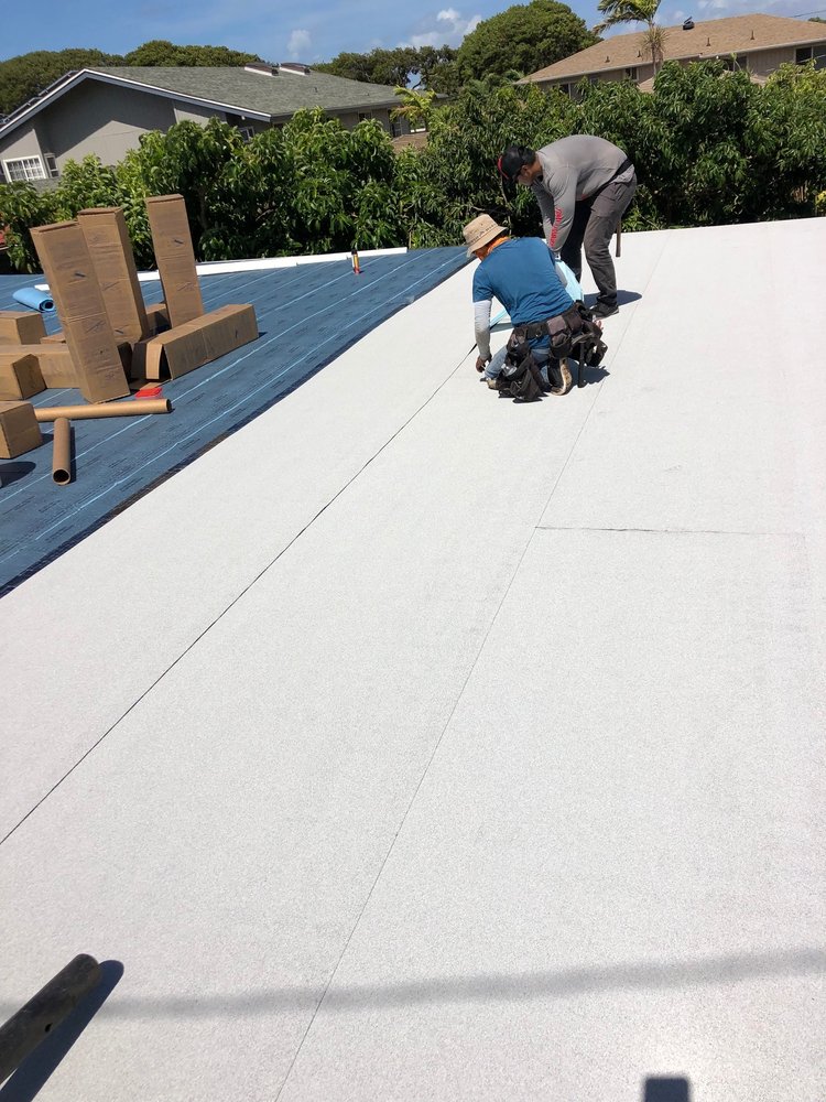 Slide of New Era Roofing