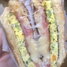 B4. Frittata, prosciutto, provolone on a sesame roll. A thing of beauty. B4. Frittata, prosciutto, provolone on a sesame roll. A thing of beauty.