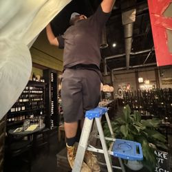 Lay It Rite Plumbing - Masking out a high end restaurant before starting the Re-pipe