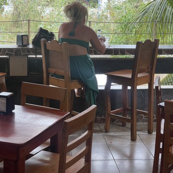 Los Abuelos - My gorgeous wife on the look out table. - Mexican Near Me - Isla Mujeres, ROO