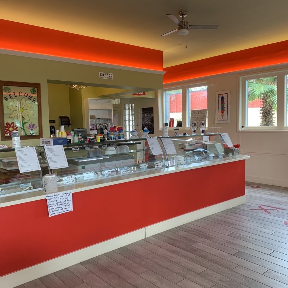 Lakeside Skoop - Spaceous inside, with larger tables for families to sit and enjoy a treat together. Even have a high chair booster seat. - Ice Cream & Frozen Yogurt Near Me - Eustis, Florida Lakeside Skoop - Spaceous inside, with larger tables for families to sit and enjoy a treat together. Even have a high chair booster seat. - Ice Cream & Frozen Yogurt Near Me - Eustis, Florida