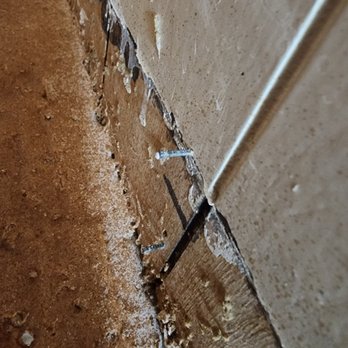 ADVANCED CONCRETE DESIGNS - Nails left sticking out of wall - Masonry/Concrete Near Me - San Antonio, Texas ADVANCED CONCRETE DESIGNS - Nails left sticking out of wall - Masonry/Concrete Near Me - San Antonio, Texas