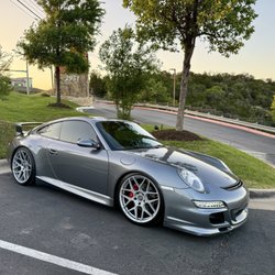 Driven By Design - 2006 Porsche 997S (suspension modifications, bolt on exhaust, wheel color change, new radiator grills, new logos)
