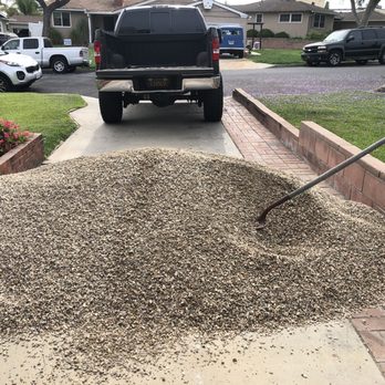 Sunburst Decorative Rock - Driver dumped rocks ready to shovel - Landscaping Near Me - Irwindale, California