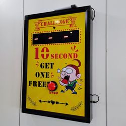 Shuyi Tealicious - Game you can play: timer counts up, if you can press the button exactly at 10.00s you get your drink free. I stopped it at 10.37s.