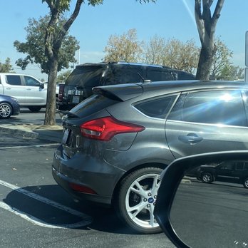 Costco - This black SUV Cadillac in between the tress today for instance - Wholesale Stores Near Me - Bakersfield, California