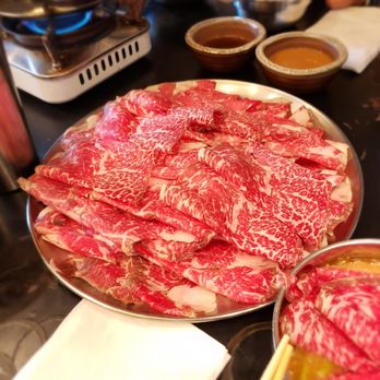Mokkoji Shabu Shabu - Wagyu meat "Kataroshin." To die for!! See the marbleization? Incredible. Melts in your mouth. Definitely a must try! - Hot Pot Near Me - Riverside, California