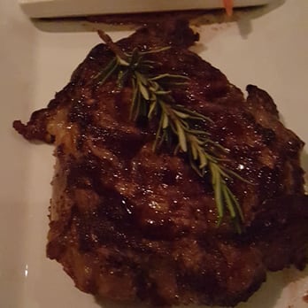 Bodega Malbec - 14oz grilled rib eye accompanied by chimchurri, pickled peppers & cheese-olive tapenade - Argentine Near Me - Toluca Lake, California Bodega Malbec - 14oz grilled rib eye accompanied by chimchurri, pickled peppers & cheese-olive tapenade - Argentine Near Me - Toluca Lake, California