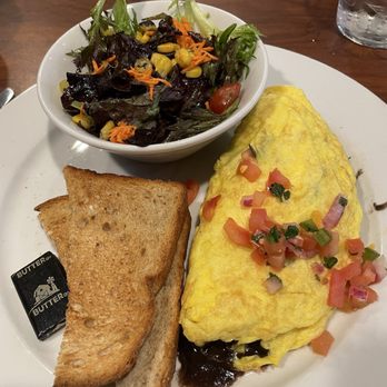 Busboys and Poets - Oaxaca Omelette* - Breakfast & Brunch Near Me - Arlington, Virginia Busboys and Poets - Oaxaca Omelette* - Breakfast & Brunch Near Me - Arlington, Virginia