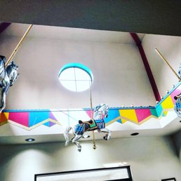 Our decorative carousel horses that continue to hang over the lobby. Our decorative carousel horses that continue to hang over the lobby.