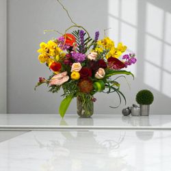 Wishing Well Flowers & Gifts - Beautiful Designers choice with tropical!