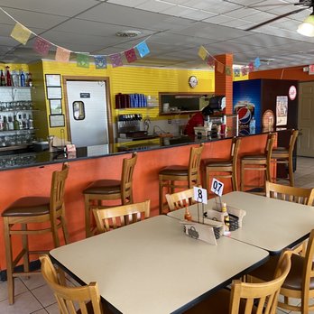 Reyes Tacos - tables and chairs in a restaurant - Mexican Near Me - Cross Plains, Wisconsin Reyes Tacos - tables and chairs in a restaurant - Mexican Near Me - Cross Plains, Wisconsin