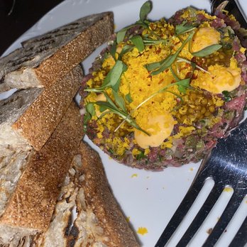 BLVD Steakhouse - Steak tartar was suggested to mix everything together and it was amazing! - New American Near Me - Chicago, Illinois