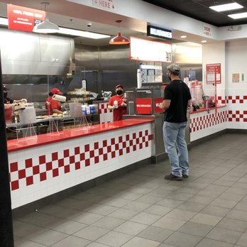 Five Guys - Reception area - ordering at right; pickup at left. - Burgers Near Me - Falls Church, Virginia