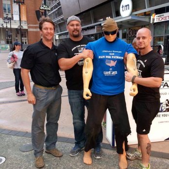 Texas Rainman - three men standing next to a mannequin - Landscaping Near Me Texas Rainman - three men standing next to a mannequin - Landscaping Near Me