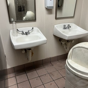 Walgreens - a bathroom with two sinks and a trash can - Drugstores Near Me - Dayton, Ohio