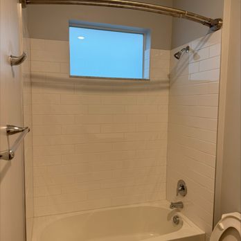 FG Homerepairs - Secured bathroom fixtures including shower curtain. - Tiling Near Me