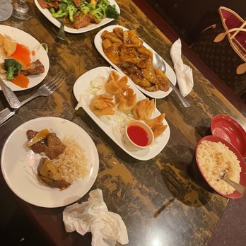 Bamboo Garden - a table with plates of food on it - Chinese Near Me - Peyton, Colorado