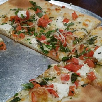 Italian Cafe - Goat cheese flat bread, no flavor other than the heavy basil - Italian Near Me - Irving, Texas Italian Cafe - Goat cheese flat bread, no flavor other than the heavy basil - Italian Near Me - Irving, Texas