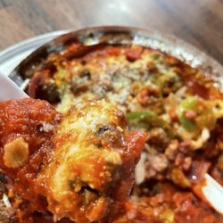 Firehouse Pizza - 8" Mini Meat Pizza with slices of pepperoni, sausage, beef, ham, and bacon.