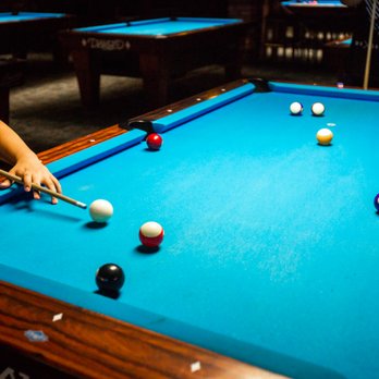 Big Dog Billiards - a man playing pool - Pool Halls Near Me - Des Moines, Iowa Big Dog Billiards - a man playing pool - Pool Halls Near Me - Des Moines, Iowa
