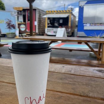 Java Rising - a cup of coffee on a picnic table - Coffee & Tea Near Me - Midtown Beer Garden, Oregon Java Rising - a cup of coffee on a picnic table - Coffee & Tea Near Me - Midtown Beer Garden, Oregon