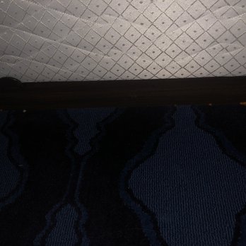 Plaza Inn and Suites - Gold fish crackers by the bed frame. We did not have these during our stay. Found this while we were looking for a shoe. - Hotels Near Me - Ashland, Oregon