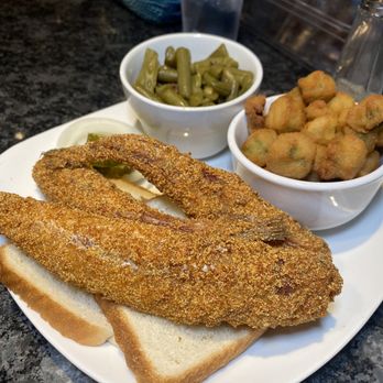 Nexxt Time Cafe - Fried Whole Catfish served up alongside crispy Fried Okra and tender Green Beans. It's a Southern classic! - Soul Food Near Me - St. Louis, Missouri Nexxt Time Cafe - Fried Whole Catfish served up alongside crispy Fried Okra and tender Green Beans. It's a Southern classic! - Soul Food Near Me - St. Louis, Missouri