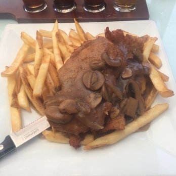 Corks Winebar & Eatery - Pork Schnitzel with mushroom gravy and French fries - American Near Me - Niagara on the Lake, Ontario
