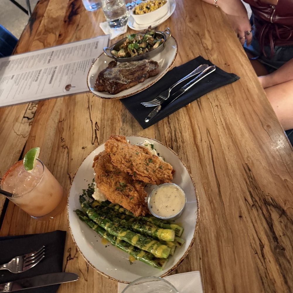 Haywire - ribeye brussels sprouts creamy corn, fried chicken with asparagus - New American Near Me - Houston, Texas Haywire - ribeye brussels sprouts creamy corn, fried chicken with asparagus - New American Near Me - Houston, Texas