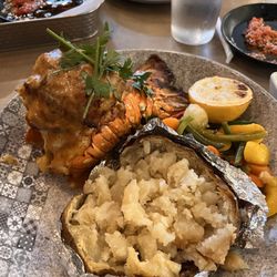 Vito's Coal Fired Pizza & Restaurant - Mother's Day Special - Stuffed Lobster with baked potato and veggies