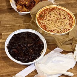 Combo C: (top to bottom 깐풍기 + 짬뽕 + 짜장면 ) and yellow radish and chicken radish as free sides Combo C: (top to bottom 깐풍기 + 짬뽕 + 짜장면 ) and yellow radish and chicken radish as free sides