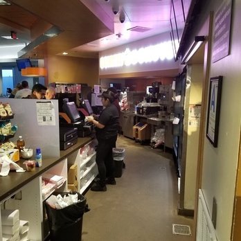 Dunkin' - a man working in a restaurant - Donuts Near Me - Westford, Massachusetts Dunkin' - a man working in a restaurant - Donuts Near Me - Westford, Massachusetts