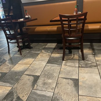 Pho Dat Thanh - Empty section we were seated in w/ dirt floors. - Vietnamese Near Me - Towson, Maryland