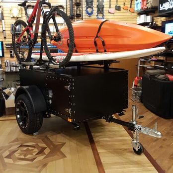 MWS Sports - Our neighbors Freespirit Recreations Highway trailer equipped with a Connelly SUP, Intense Carbine, and Emotion Guster - Bike Rentals Near Me - Bend, Oregon MWS Sports - Our neighbors Freespirit Recreations Highway trailer equipped with a Connelly SUP, Intense Carbine, and Emotion Guster - Bike Rentals Near Me - Bend, Oregon