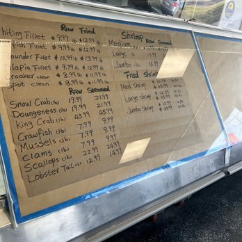 Tidewater Seafood - a menu on the side of a food truck - Seafood Markets Near Me - Norfolk, Virginia