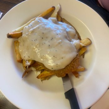 The Cracked Egg - Chicken Fried Steak w/ gravy and fries - Breakfast & Brunch Near Me - Milliken, Colorado The Cracked Egg - Chicken Fried Steak w/ gravy and fries - Breakfast & Brunch Near Me - Milliken, Colorado