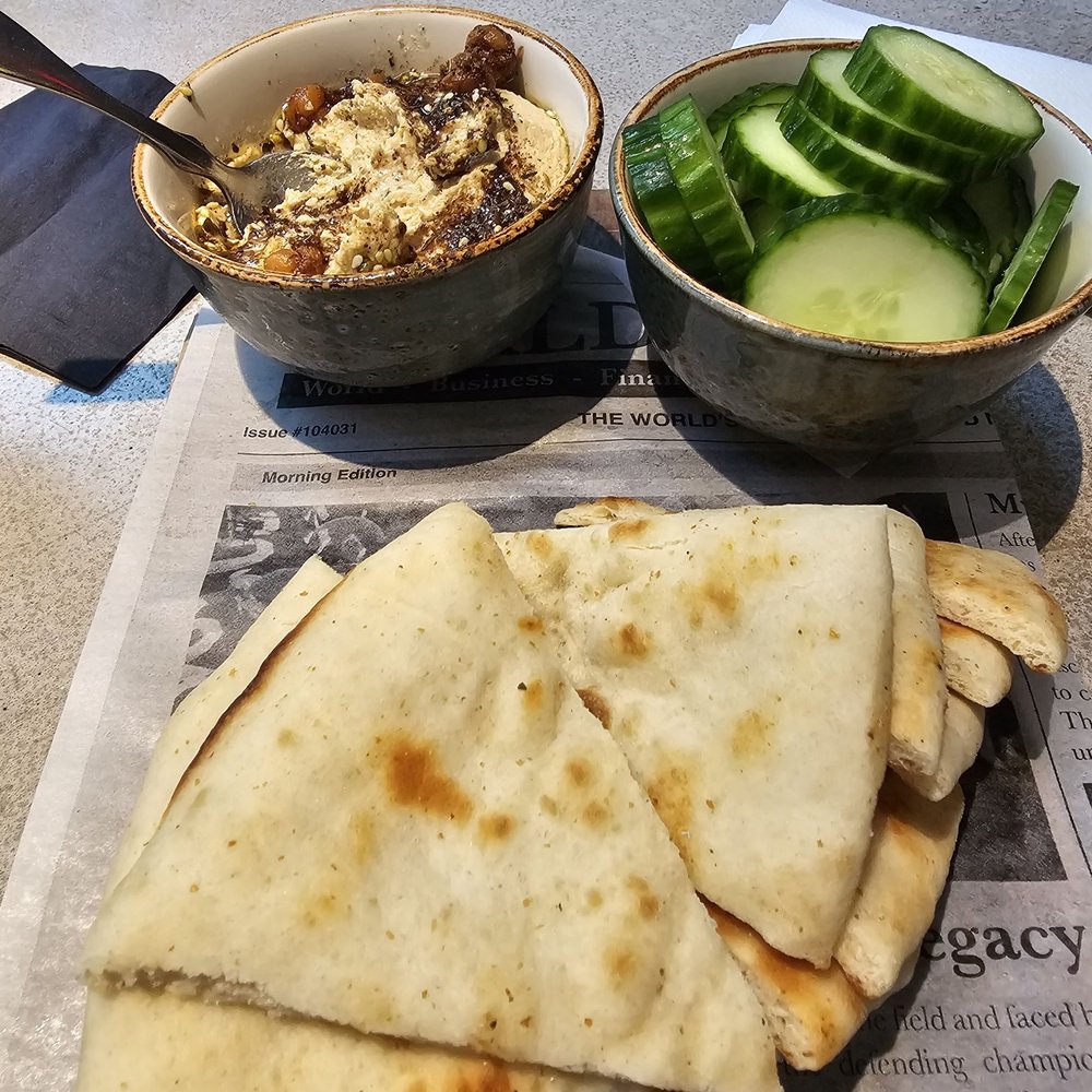 Vasili's Kitchen - Hummus with pita as a special, I added the cucumber - Mediterranean Near Me - Gaithersburg, Maryland Vasili's Kitchen - Hummus with pita as a special, I added the cucumber - Mediterranean Near Me - Gaithersburg, Maryland