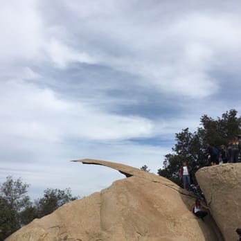Potato Chip Rock - Quick snap of potato chip rock while people are getting off the rock - Hiking Near Me - Poway, California Potato Chip Rock - Quick snap of potato chip rock while people are getting off the rock - Hiking Near Me - Poway, California